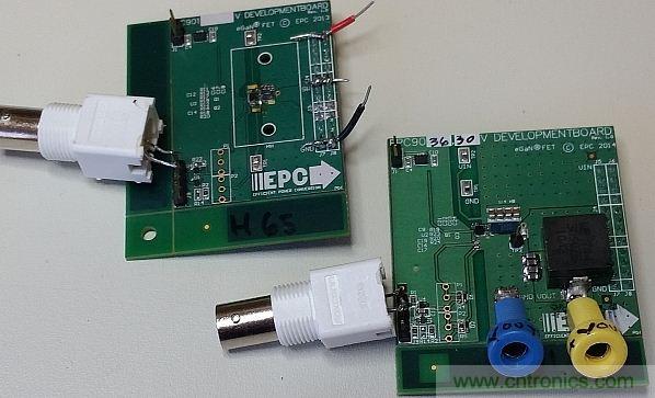 圖1：這里僅在左側(cè)的電路板上配備了半橋配置，右側(cè)的電路板配備了完整的DC-DC轉(zhuǎn)換器。香蕉插座可將測試板連接至電子負載。通過BNC連接器可連接至外部脈沖發(fā)生器。